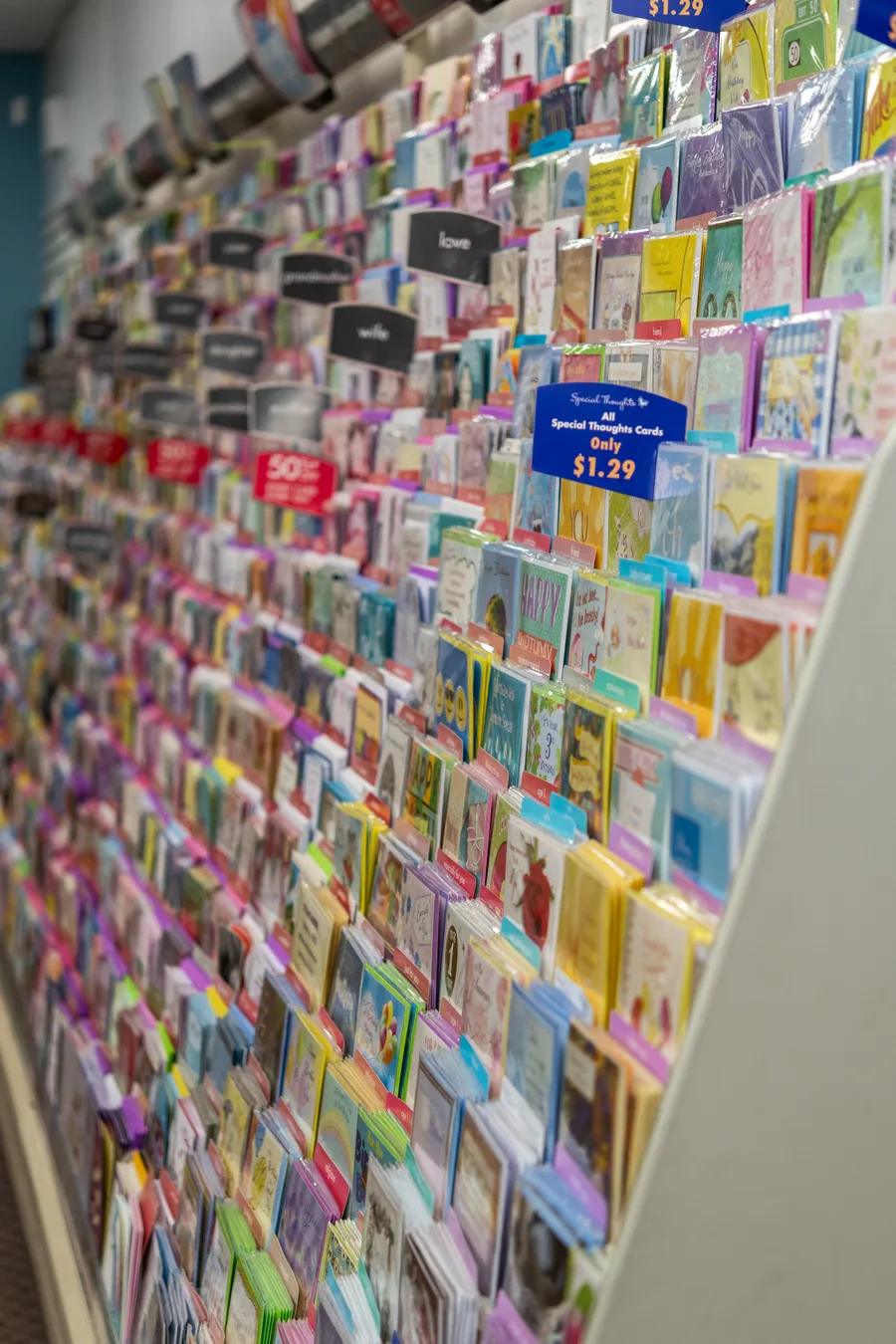 Rows of colorful greeting cards for birthdays, anniversaries, and everyday occasions